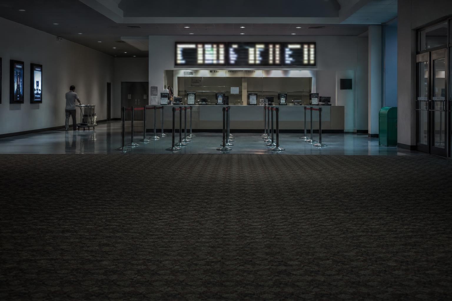 A box-office lobby after hours as Spider-Man's record run nears $900 million domestic.