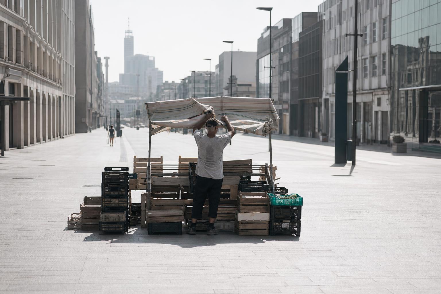 A trader packs up early as "feels like" heat stress crosses dangerous levels across Europe.