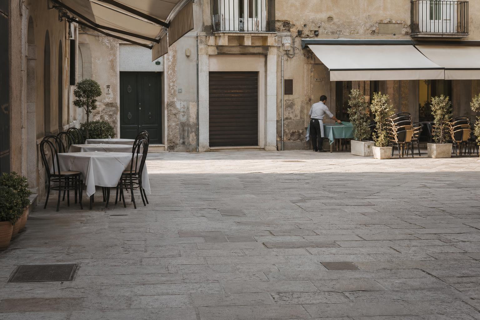 An off-peak piazza fills slowly as travellers shift trips to May and September.